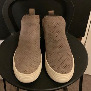 Used pair of dolce vita high top sneakers. Size 10 Tan color.